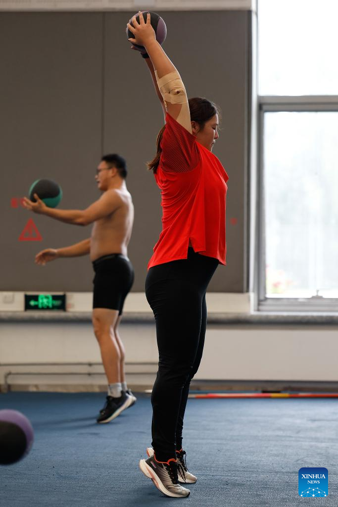 Chinese athletes attend training session in Beijing
