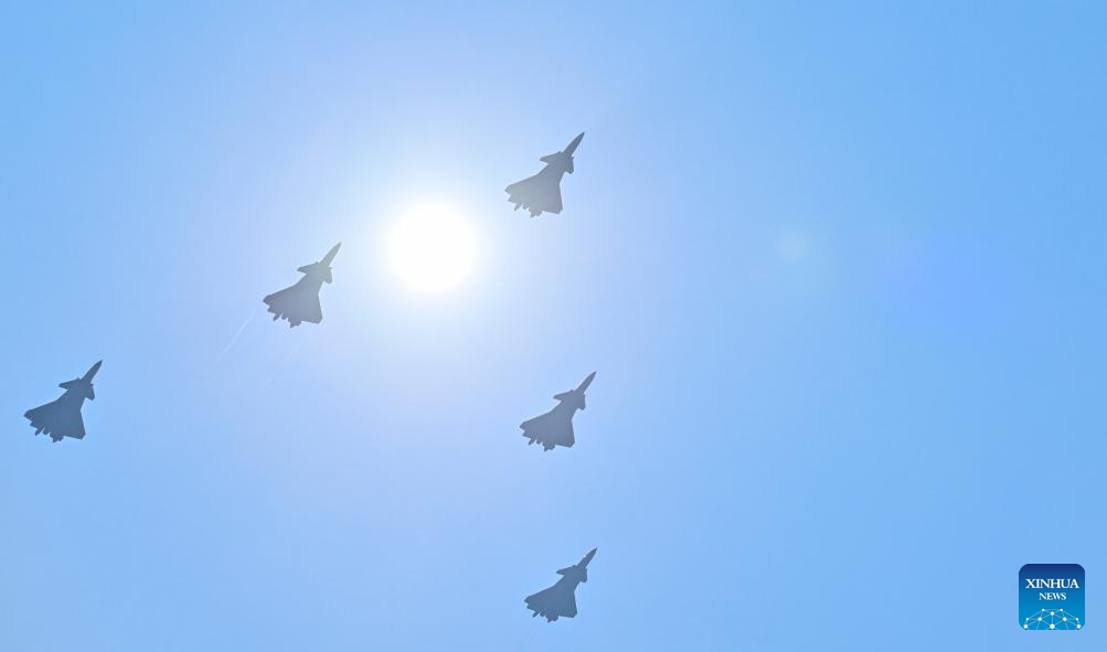 Fighter jets fly over Tian'anmen Square in parade